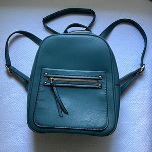 Backpack,blueish turquoise in color,never used